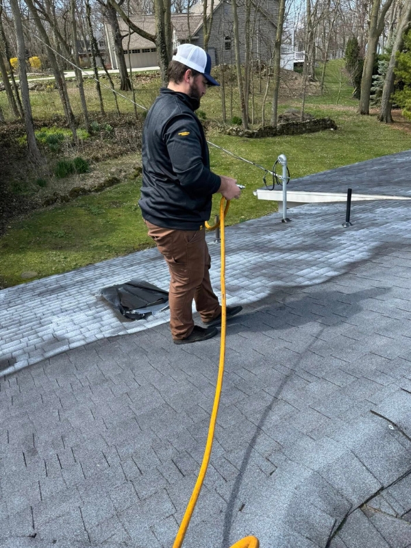 NORR applying Roof Maxx